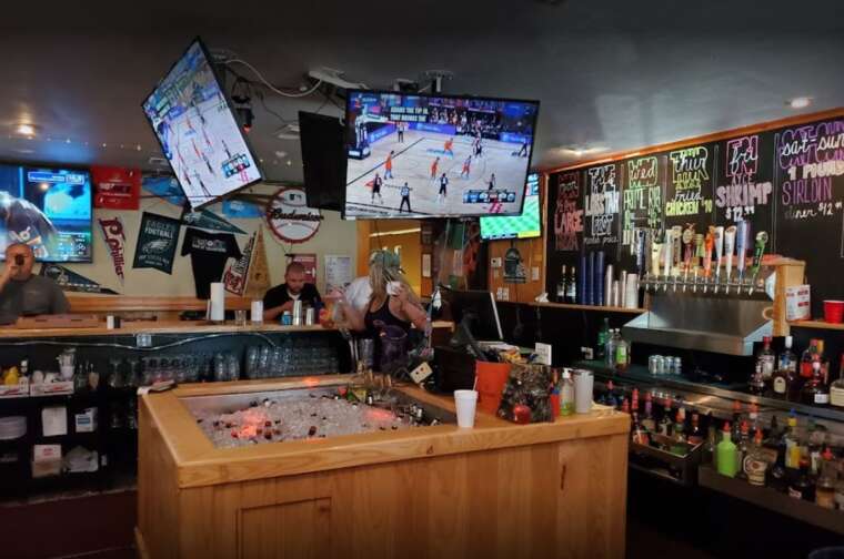 behind the bar Busters Sports Tavern